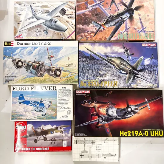 Eight Vintage Model Plane Kits (opened)