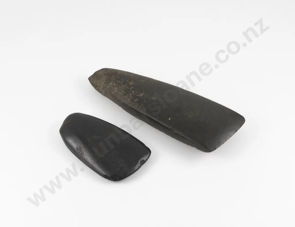 Two Toki with One of Rounded Form and the Other of Flared Form Image 1++