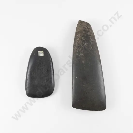 Two Toki with One of Rounded Form and the Other of Flared Form