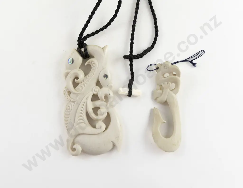 Two Modern Carved Bone Pendants Image 1++