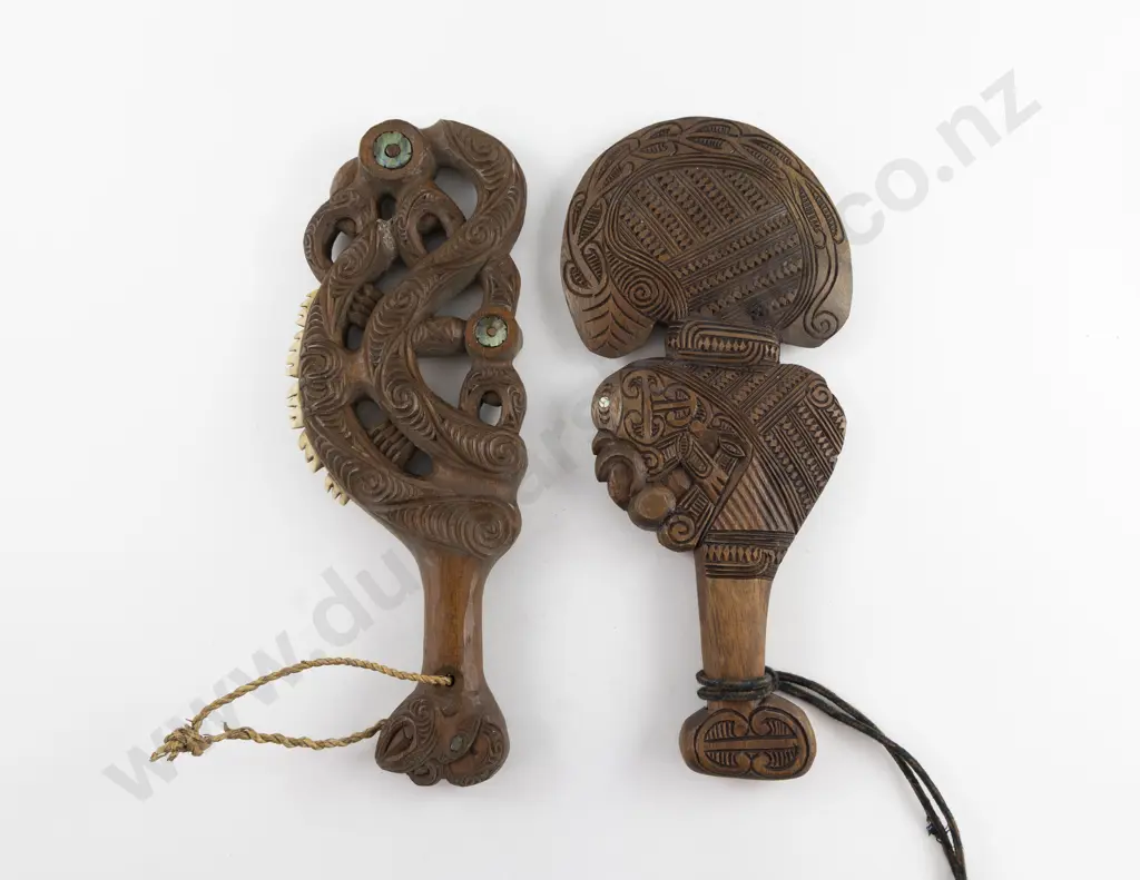 One Modern Wooden Carved Kotiate with paua inset and other Image 1++