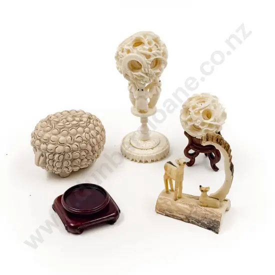 Two Small Carved Ivory Puzzle Balls with Antler Carving and Pottery Sheep
