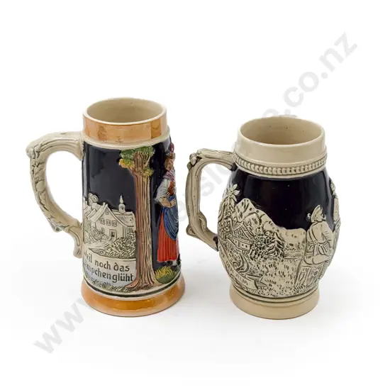 Two German Relief Molded Steins