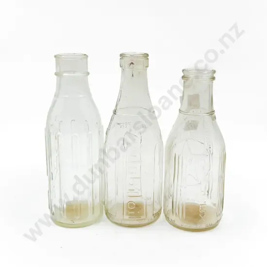 Three Assorted Vintage Glass Oil Bottles