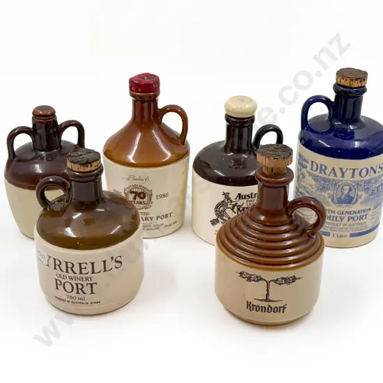 Four Assorted Stoneware Flagons