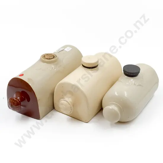 Three Assorted Stoneware Hot Water Bottles