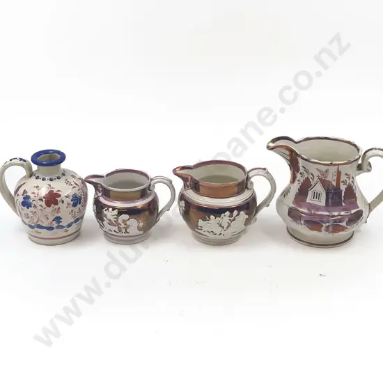 Four Copper Lustre Jugs