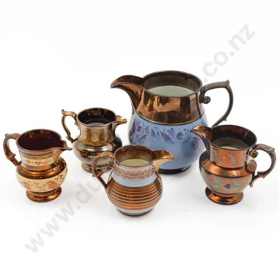 Five Copper Lustre Jugs
