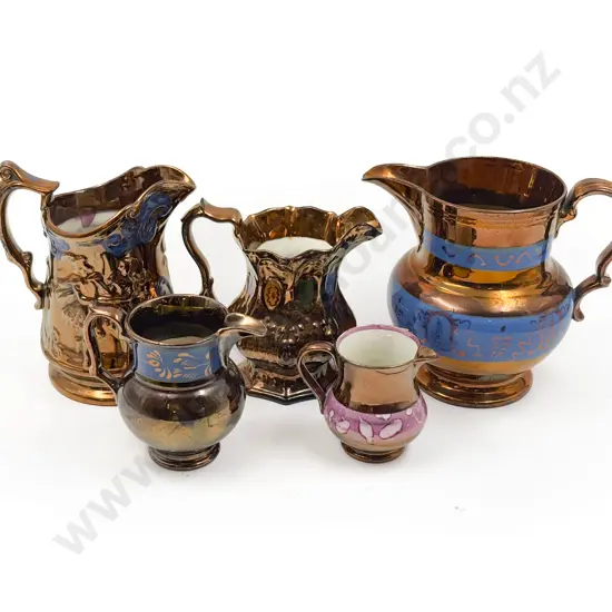 Five Copper Lustre Jugs