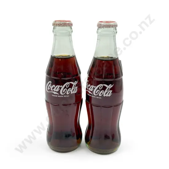 Pair of Vintage Unopened Glass Coke Bottles