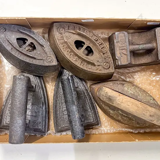 Five Assorted Vintage Flat Irons together with Cast Iron Weight
