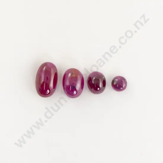 Four Unmounted Star Rubies