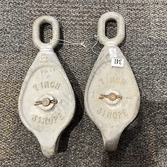Two Cast Metal 7 Inch Rope Pulleys