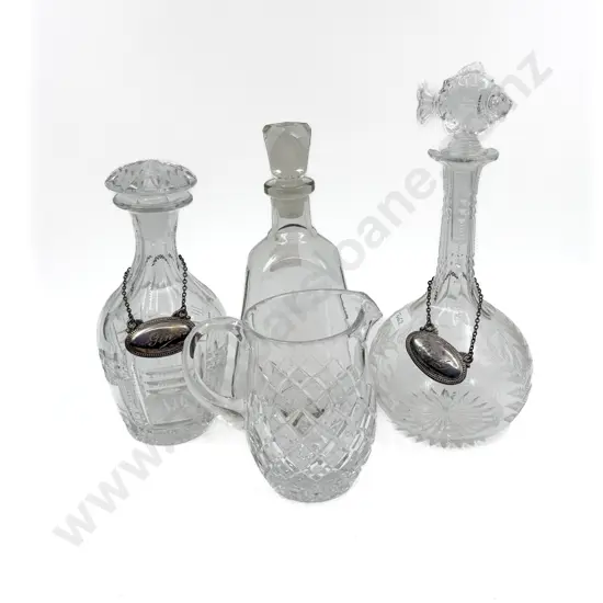 Three Assorted Decanters together with Crystal Jug