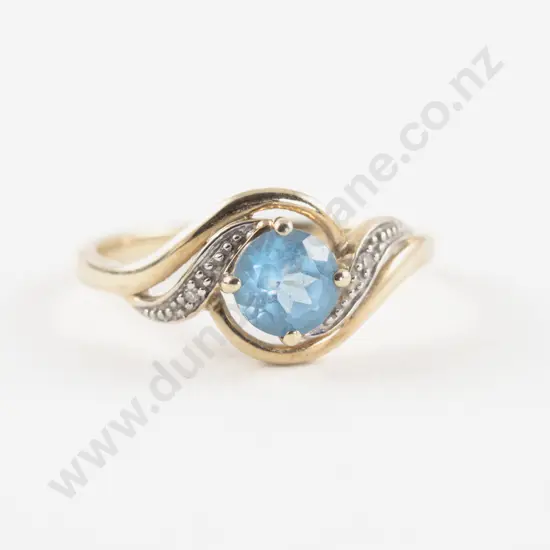 10ct Three Stone Topaz and Diamond Ring