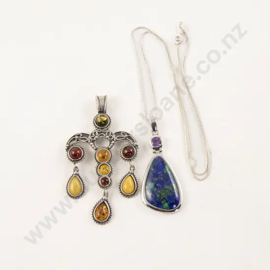 S/S Amber Pendant together with S/S Lapis Pendant