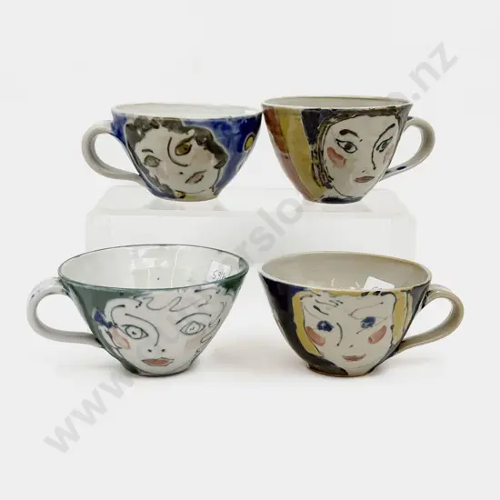 Four Pottery Mugs