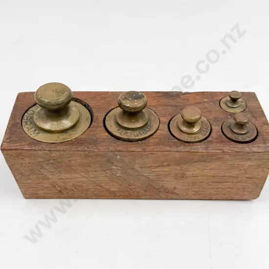 Five Cast Brass Weights in Oak Stand