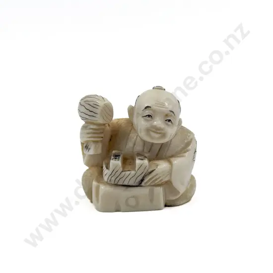 Signed Ivory Netsuke of a Sandal Maker