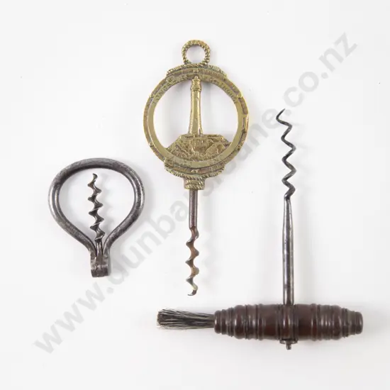 Three Vintage Corkscrews: steel on fruitwood turned handle with brush