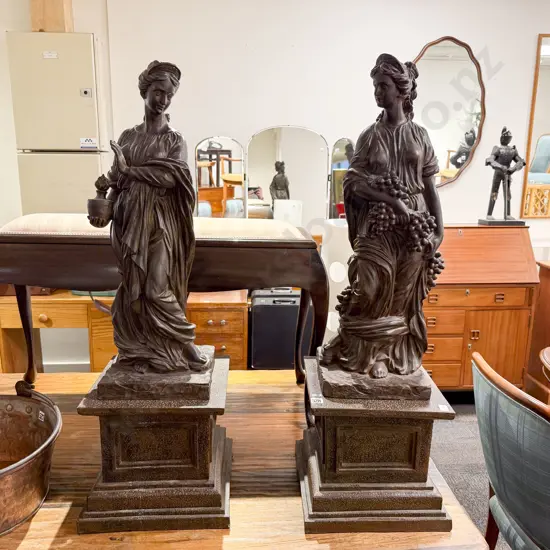 Two Resin Statues on Stands