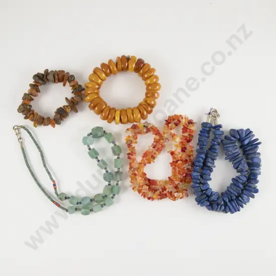 Three Various Beaded Necklaces and Two Amber Bracelets