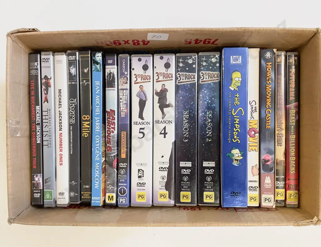 Box of Assorted DVDs Image 1++