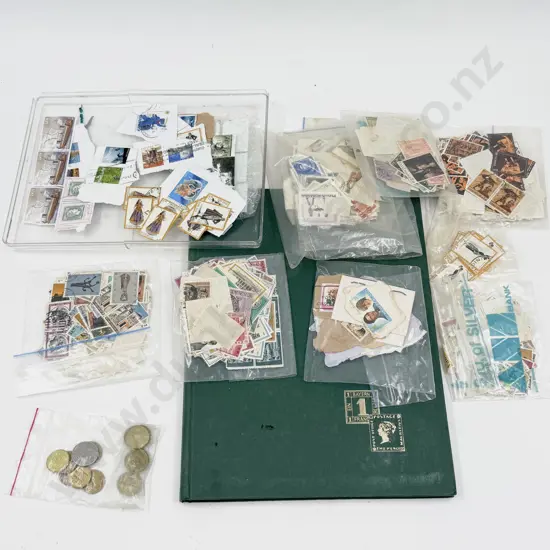 Small Qty of Assorted Loose Stamps and Empty Stamp Album
