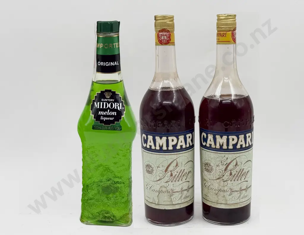 Boxed Bottle of Midori Together with Two Bottles of Campari Image 1++