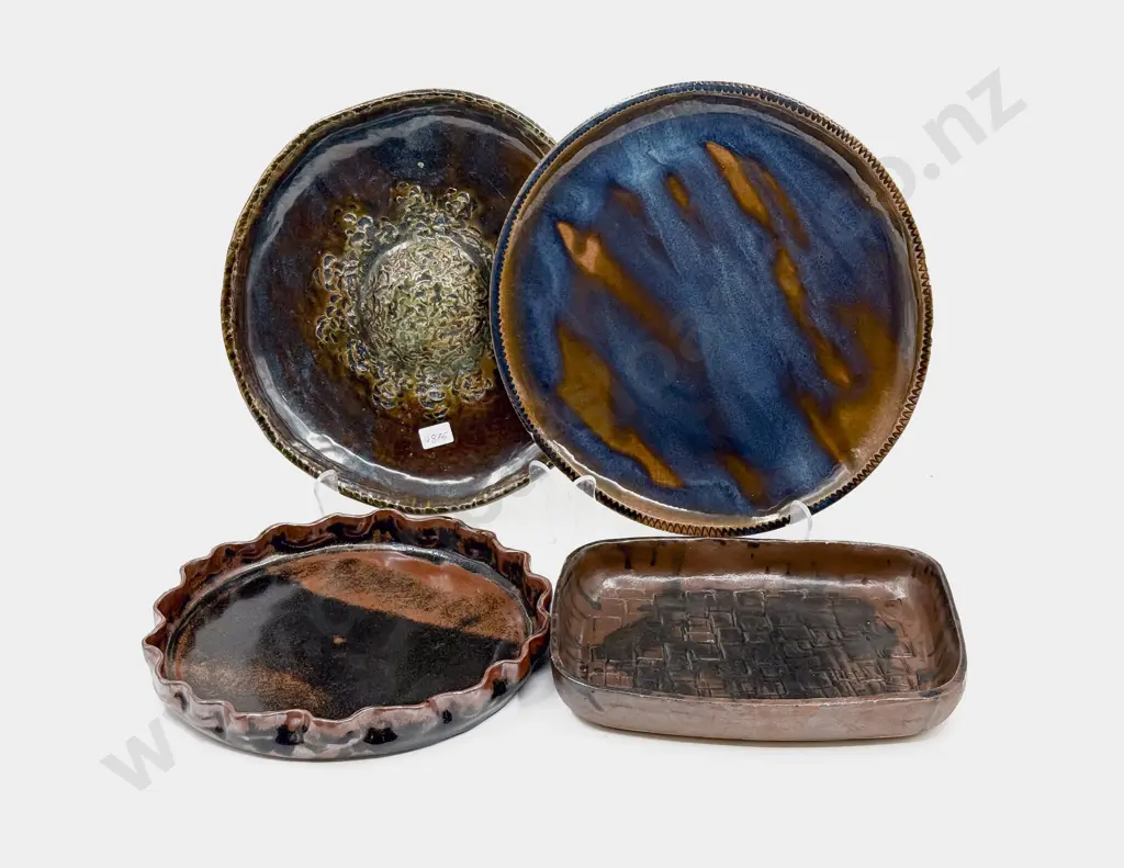 Four Assorted Pottery Dishes Image 1++