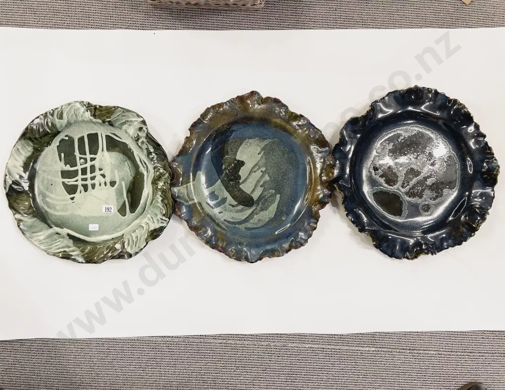 Three Assorted Pottery Chargers Image 1++