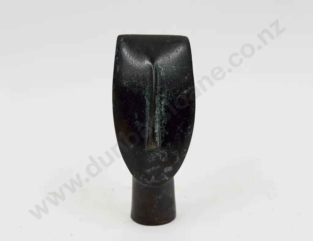 A Bronze Stylized Bust Image 1++