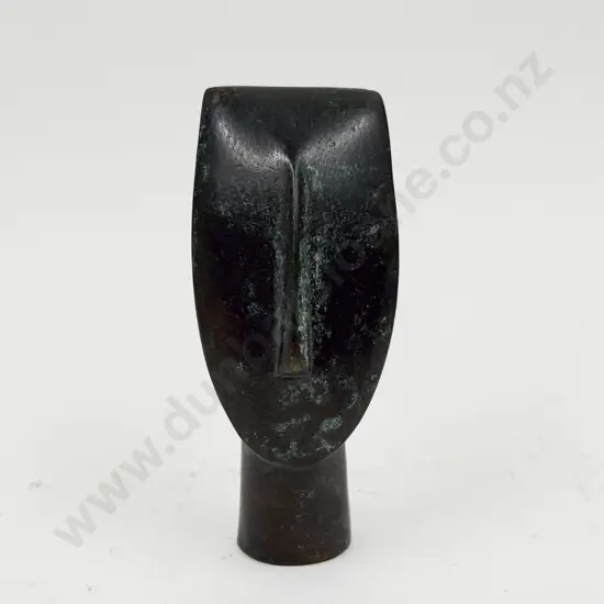 A Bronze Stylized Bust