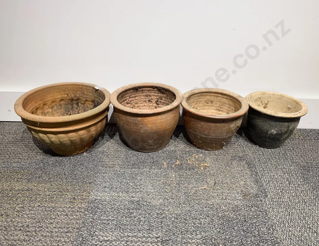 Four Assorted Garden Planters Image 1++