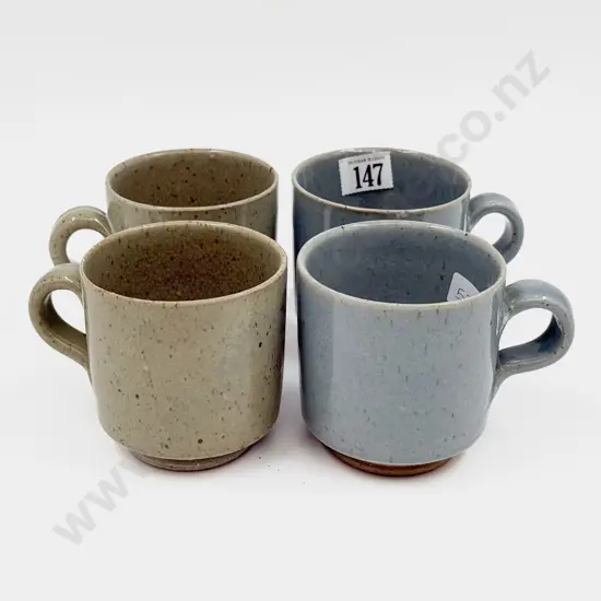 Four Paul Melser Pottery Mugs