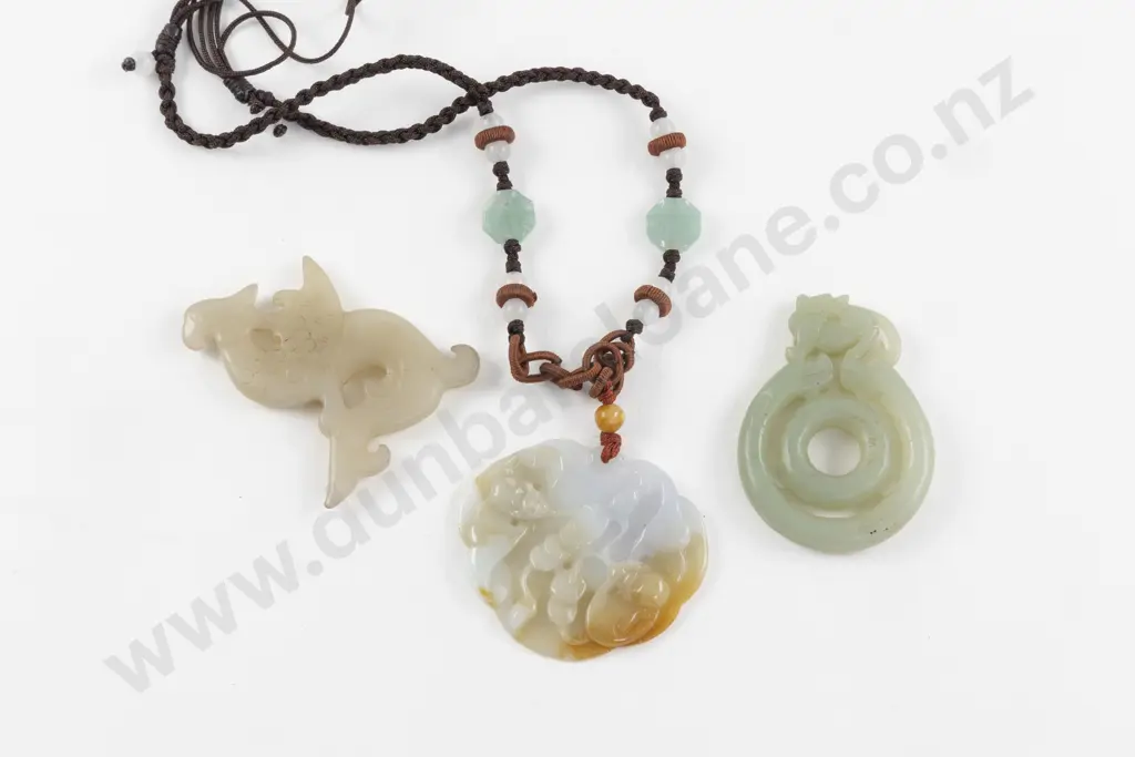 Three Carved Jade Pendants Image 1++