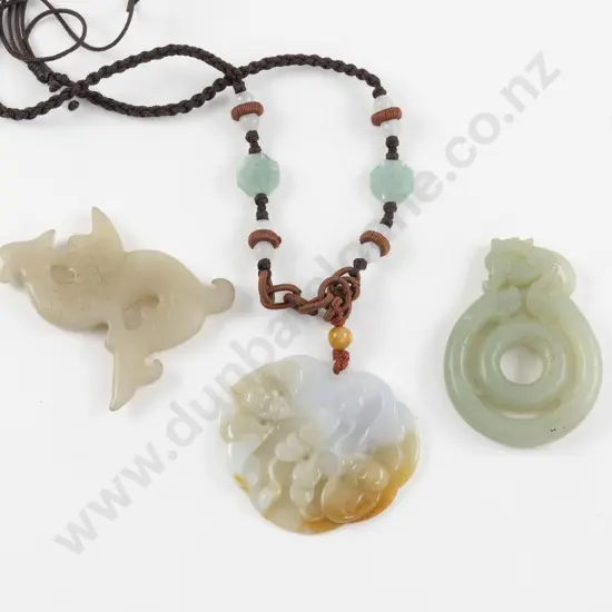 Three Carved Jade Pendants