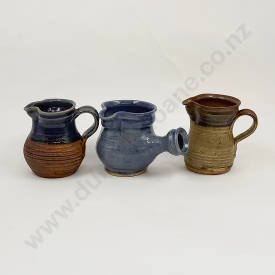Three Janet Wright Jugs