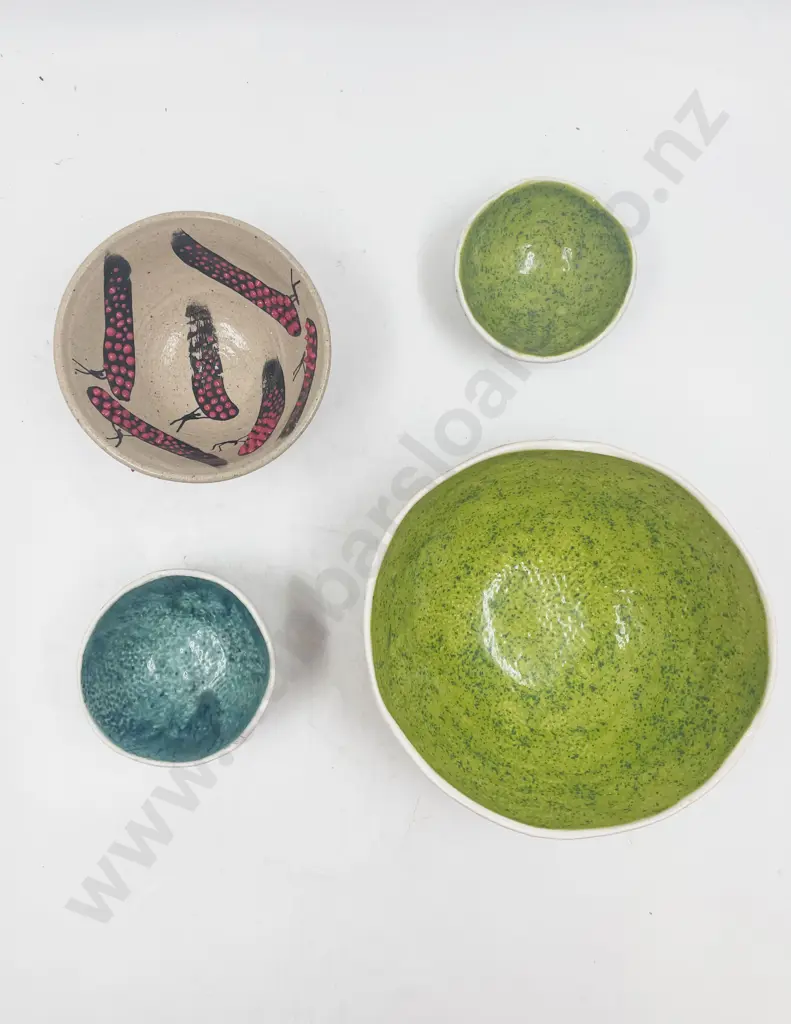 Four Assorted Pottery Bowls Image 1++