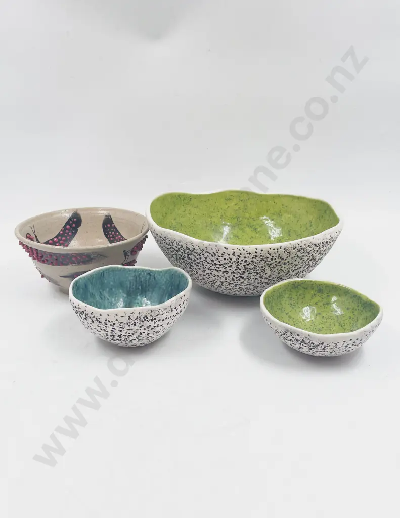 Four Assorted Pottery Bowls Image 1++