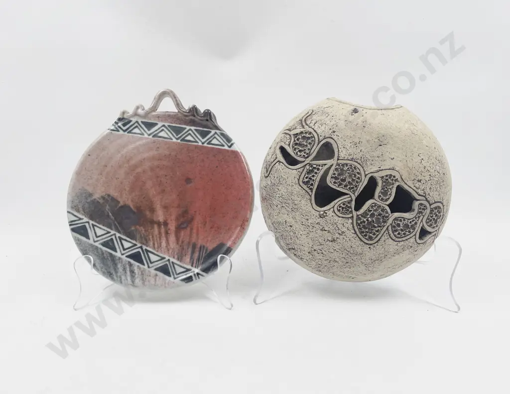 Two Pottery Wall Hangings Image 1++