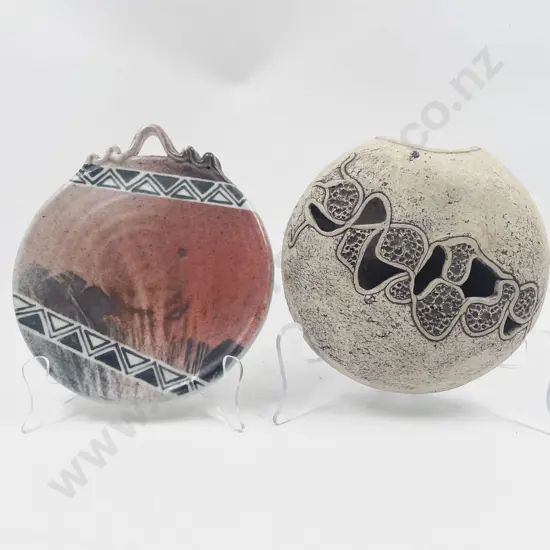 Two Pottery Wall Hangings