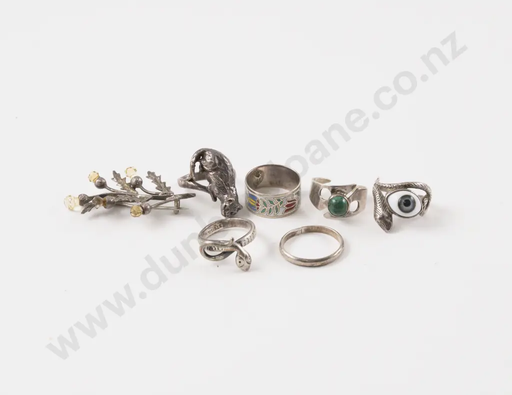 Collection of Six S/S Rings and Thistle Brooch Image 1++