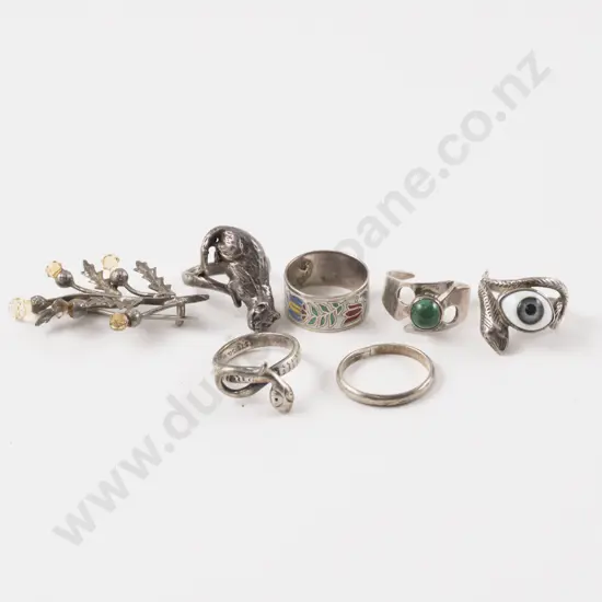 Collection of Six S/S Rings and Thistle Brooch