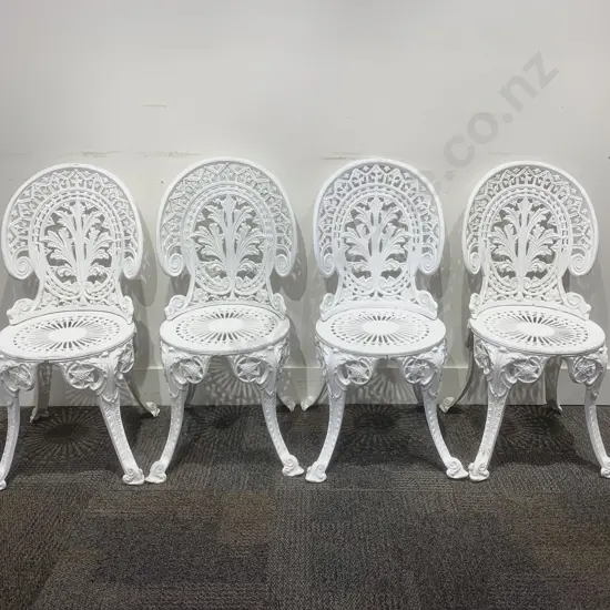 Set of Four White Painted Cast Metal Outdoor Chairs