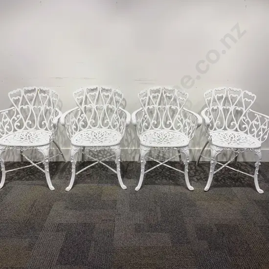 Set of Four White Painted Cast Metal Outdoor Armchairs