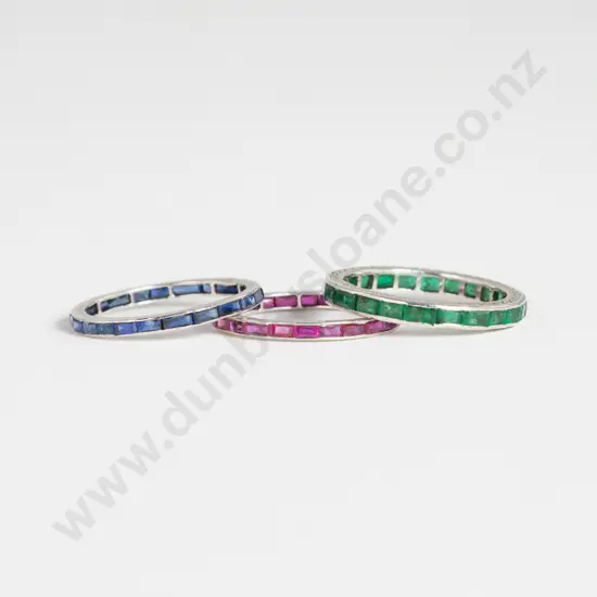 Three Platinum Sapphire Ruby and Emerald Eternity Bands