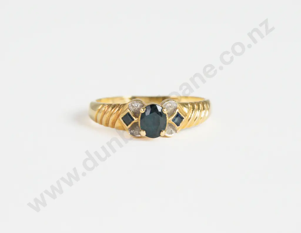 18ct Seven Stone Sapphire and Diamond Chip Ring Image 1++