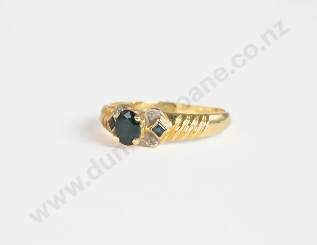 18ct Seven Stone Sapphire and Diamond Chip Ring Image 1++