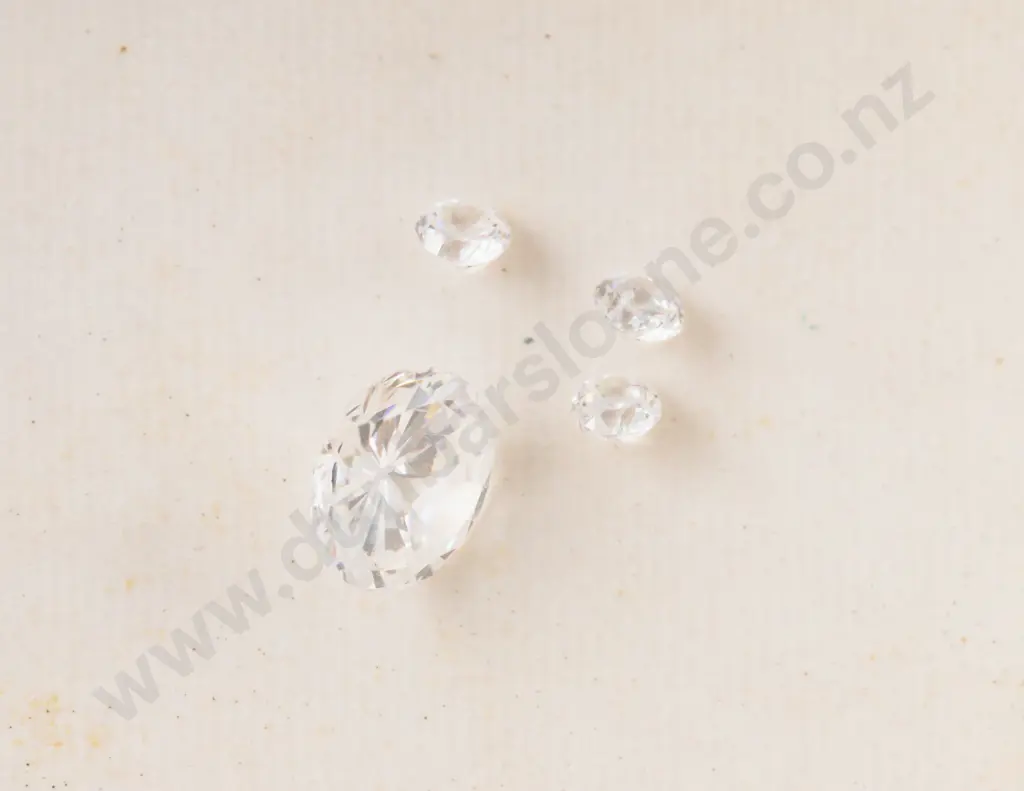 Four Unmounted Imitation Diamonds Image 1++